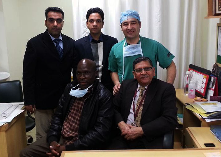 Dr. H S Bhatyal with patient and Dr. Bahtiyor from Uzbekistan