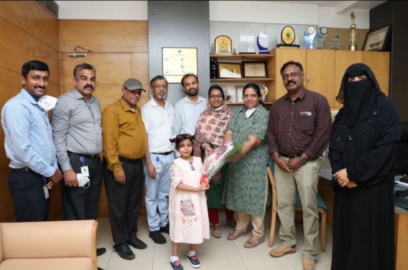 Seven-year-old patient Ala Waleed with her family members and the team of doctors at Aster MIMS Calicut India